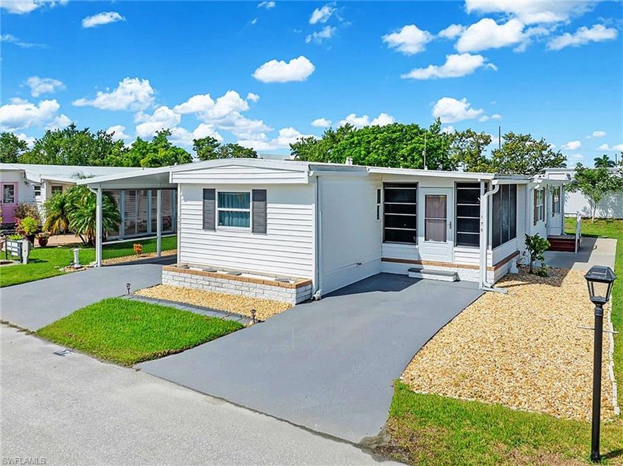 This perfect little Southwest Florida getaway is waiting for you in Alligator Park, a wonderful 55+ community, in Punta Gorda. NO LOT RENT HERE, instead you pay a reasonable monthly amount of $298 that covers water, sewer, trash and recreational amenities. The park is also NOT IN A FLOOD ZONE andis TURNKEY & READY & WAITING! There are numerous updates to mention including the bigger ticket items like a NEW 2023 ROOF INCLUDING THE CARPORT AREA, 2024 WATER HEATER, & 2020 A/C with UV light, WATER FILTER, and updated ELECTRICAL PANEL. This 2 bedroom/2 bath home feels spacious with the extra 11’ x 35’ living area that’s part of the air-conditioned space. You can use the room for multiple purposes including dining, den, and space for visiting guests. The larger bathroom had a new walk-in shower installed in 2024. There are 2 places to park your cars, one approx. 11’ x 28’ and the other approx. 11’ x 37’, both refinished this year with a gorgeous dark grey epoxy flake finish. A 12’ x 16’ shed is at the end of the carport area. The PRICE OF THE HOME INCLUDES THE PARK SHARE OWNERSHIP OF $60,000. Golf carts are not only allowed but encouraged in this fun community. Your social life can be as active as you desire with numerous park activities. Alligator Park is also only a few miles from beautiful downtown Punta Gorda and the Punta Gorda Airport. Ask for additional information on all the furniture and other furnishings that will be included!!