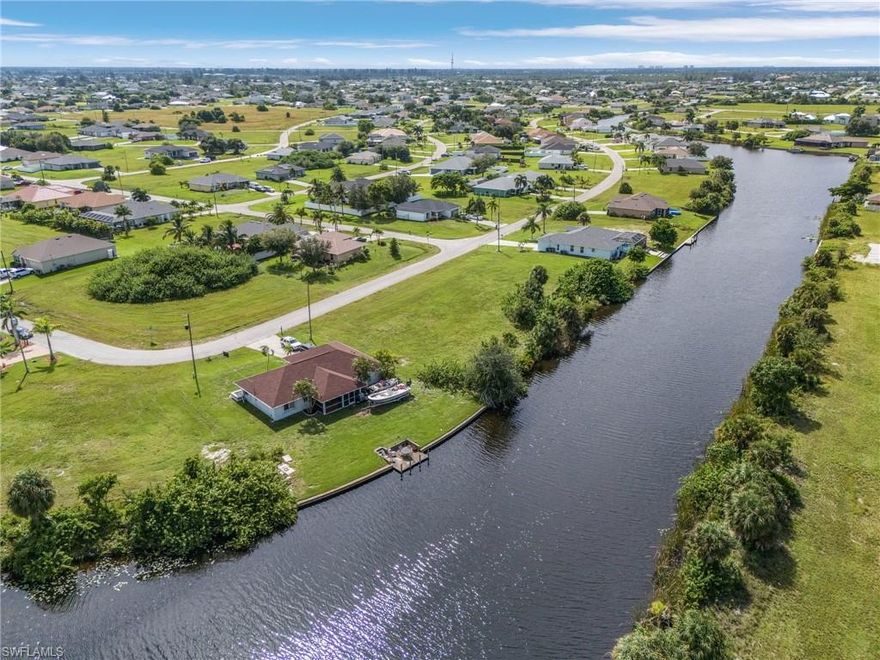 Prime Waterfront Lot in Cape Coral – Build Your Dream Retreat!

Discover the perfect opportunity to create your custom waterfront paradise on this exceptional freshwater canal lot in Cape Coral, Florida. Nestled in a highly desirable neighborhood, this prime homesite offers breathtaking water views, serene surroundings, and direct access to Florida’s relaxed, outdoor lifestyle.

Imagine waking up to peaceful water vistas, designing your dream home with ample space for a pool, dock, or outdoor oasis, and ending your days with stunning sunset views over the canal. With its unbeatable location and endless possibilities, this lot is a rare find for those looking to build their own slice of paradise in Southwest Florida.

Don’t miss this incredible opportunity—secure your waterfront dream today!