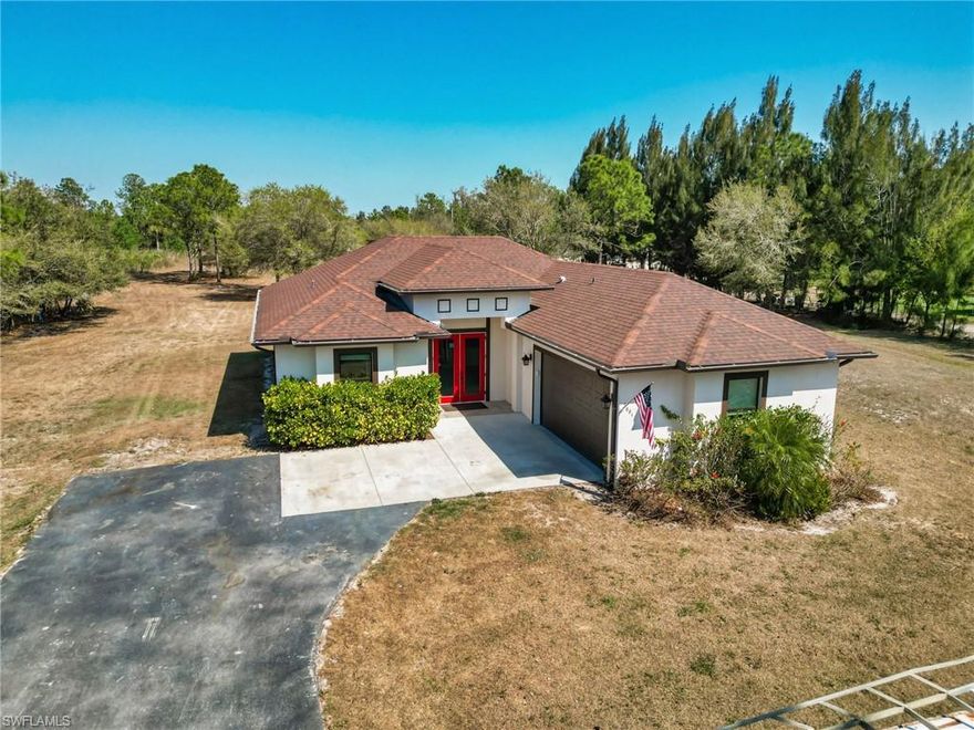 Beautiful 3 bedroom plus den home located on 2.73 acres in Golden Gate Estates. This home was built in 2018 and shows like new. This is a fantastic location close to Ave Marie. This home has be beautifully upgraded with custom ceilings with crown molding, stainless steel appliances, custom backsplash, tile floors throughout including the lanai. 2.73 acres is much larger than other properties in the area. For the lot size and condition of the home this property to priced to move quickly as owners have already moved out. Come see this home quickly because it will not last long.