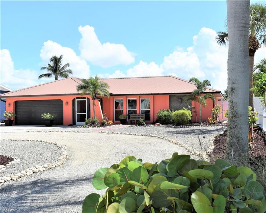 This exceptionally spacious WATERFRONT 3BR/2B + Family room pool home is right across the street from the Gulf & has a Gulf view. Our world famous white sand beach is just steps away, along with the most beautiful sunsets imaginable.The canal (with covered dock) has excellent Estero Bay & Gulf of Mexico access. The rear of this fun and cheery home faces East, with absolutely delightful sunlight streaming through the home, welcoming each new day with scents of jasmine and Frangipani wafting thru the air. The canal front pool and spa are under a screened lanai, with the large outdoor entertainment area perfect for the whole family. With over 3700 total sq. ft. you will not want for space. The fenced & very private back yard is practically maintenance free. The icing on the cake is that this handsome home is an EXCELLENT weekly permitted rental property, furnished with all the extras any guest could want! New windows and doors are hurricane rated (and shutters are available for "insurance")! This mid-island location is close to shopping & dining with easy access off the island. Wonderfully updated home is a super INCOME & INVESTMENT opportunity & definitely a MUST SEE!