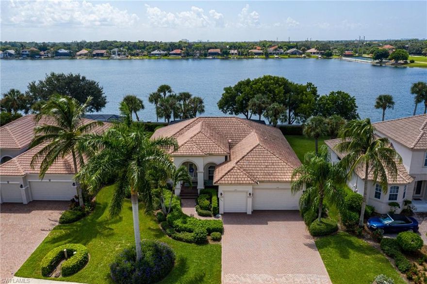 Immaculate ORIGINAL OWNER 3 bed+den/3 bath POOL home offered in gated Emerson Square.  Check out that VIEW!  So many desirable upgrades- Almost 1/3 acre lot, open concept living with formal dining and eat in kitchen, large pantry, 12ft ceilings, crown molding, SOUTH REAR EXPOSURE, large lake view, 3-CAR GARAGE, tile floors throughout, custom designer light fixtures, whole house water filtration, and plantation shutters on every window.  Impeccable condition, AC- 2021 comes with warranty, HURRICANE SHUTTERS on every opening (electric/manual).  En suite guest bedrooms and an oversized primary suite with dual closets, large shower, water closet and soaking tub.  The pool area is an entertainers dream- expansive lake views and plenty of space for everyone.  Location is ideal, great schools, adjacent to beaches and shopping, close to downtown and Barbara B Mann theatre. No CDD.  This is THE opportunity for a sizable property in pristine condition, welcome to Emerson Square!