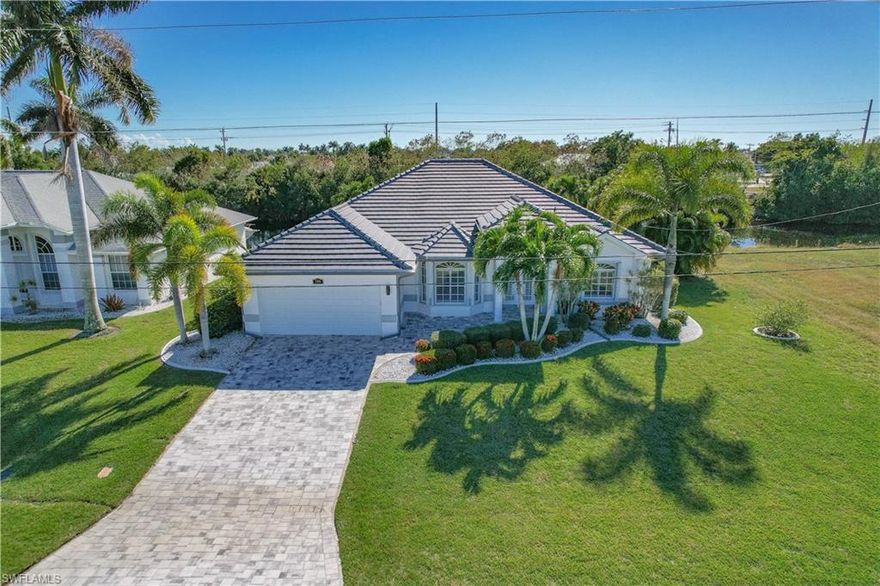 Do you want everything to be new without having to wait a year for it to be built? Here is the answer, a beautiful Gulf Access, Pool Home that has been updated with great care and looks amazing! New Slate Tile Roof, New Paver Driveway and Walkway. The pool has been resurfaced and added a new pool heater. New electric panel, New plumbing, the list goes on and on. Also includes a 16,000 lbs. boat lift with remote control lift and new Bimini top and trex decking around the lift. This home has been painted inside and out with plantation shutters for the windows and has a beautifully redone kitchen with new State of the Art Samsung appliances surrounded by custom cabinetry and topped with premier custom granite countertops. There is more and more about this home I could share but you will want to come see it for yourself before it's gone. Make your appointment today!