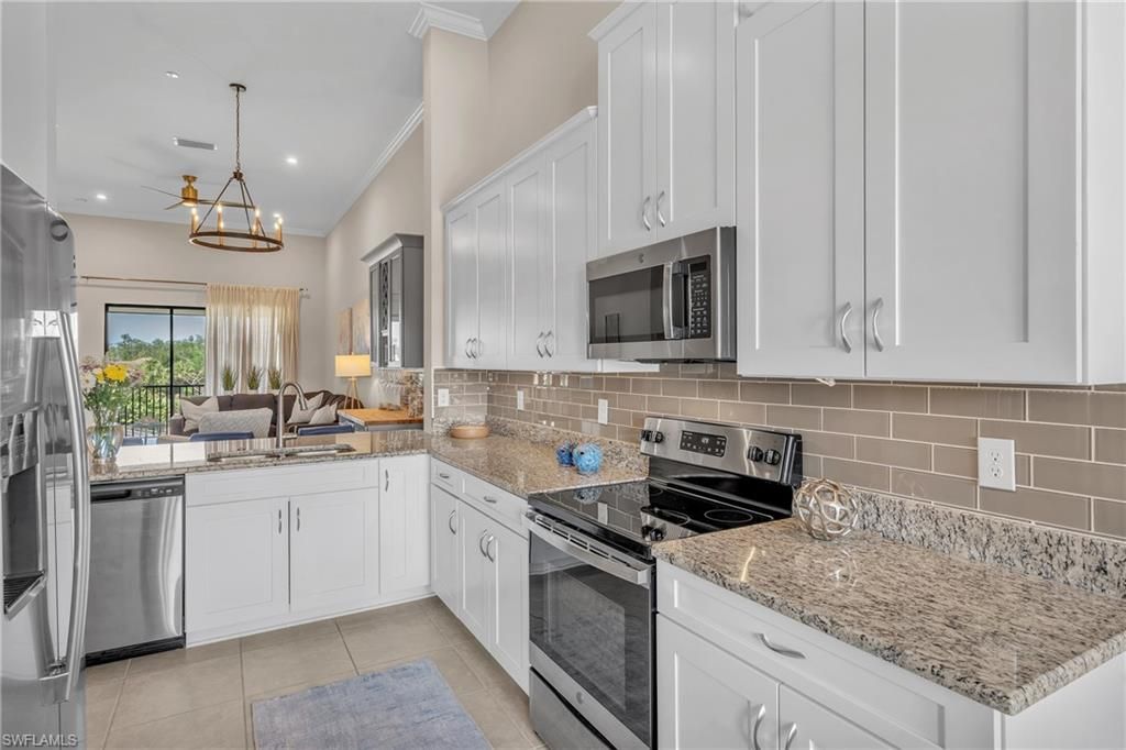 Photo of 9403 Pocida CT #203, NAPLES, FL 34119 (MLS # 226015585)