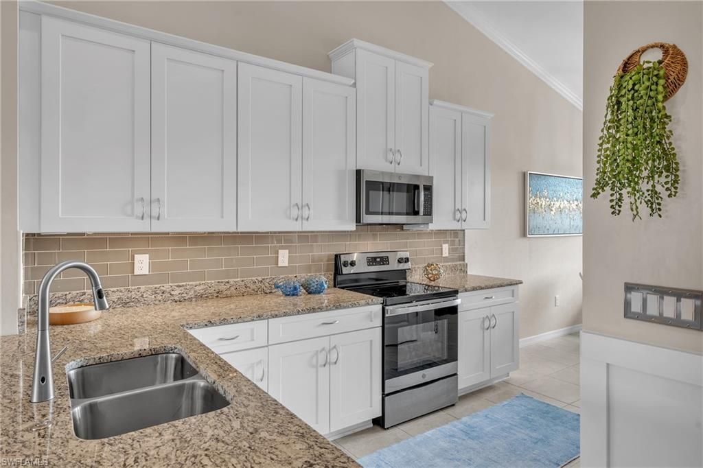 Photo of 9403 Pocida CT #203, NAPLES, FL 34119 (MLS # 226015585)