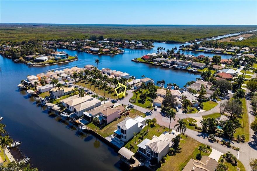There’s something special about arriving home to the water, the quiet, the light, and the sense that life naturally slows down. 148 Eveningstar Cay offers that feeling every day, set within the beautifully maintained waterfront community of Eveningstar Cay. This two-bedroom, two-bath single-family home with a two-car garage features approximately 1,359 square feet under air, has been freshly painted, and is ready for its next chapter. From the moment you step through the screened entry lanai, you’ll feel the potential. This is a home that has been lovingly cared for and is now waiting for someone to personalize it, update it, and truly make it their own. Southern exposure fills the home with natural light, while the screened rear lanai and outdoor patio invite you to relax, entertain, or simply enjoy the peaceful rhythm of the water behind your home. Positioned on a wide open canal, the views are expansive and calming, perfect for morning coffee, evening sunsets, or watching the gentle activity of boats passing by. Boating and fishing aren’t just hobbies here, they are part of everyday life. From your private dock, navigate through the pristine waterways of the Ten Thousand Islands, following a marked channel that leads directly to the Gulf of America. Along the way, discover quiet beaches where you can pull up, explore, and enjoy unforgettable days on the water. One of the true joys of Eveningstar Cay is enjoying waterfront living without the maintenance. Low HOA fees provide peace of mind while preserving the charm of the community, which also offers a community pool and clubhouse, perfect for gathering with neighbors or unwinding after a day on the water. Tucked within the serene surroundings of Port of the Islands, this location offers the best of both worlds. Enjoy peaceful, nature-rich living with convenient access to everything you need. Publix is just 15 minutes away, Goodland and Marco Island are approximately 20 minutes away, and the dining, shopping, and culture of Naples are about 30 minutes away. 148 Eveningstar Cay isn’t just a home. It’s an opportunity to create something personal, to live on the water, and to embrace a lifestyle that many only dream about.