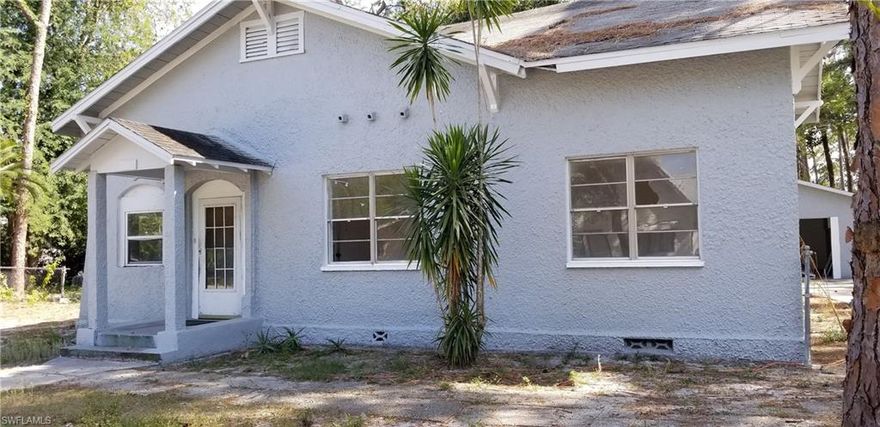 A single family home situated on an amazing one acre corner lot.  It would be great for a family.  Plenty of room to roam.  This cute home has french style doors on the interior, an updated kitchen with tile floors, tiled backsplash, wood cabinets and stainless steel appliances.  There 3 bedrooms and 2 baths.  There is also a newer detached car garage with a concrete driveway.  Conveniently located near downtown Fort Myers between Fowler Street and US41.