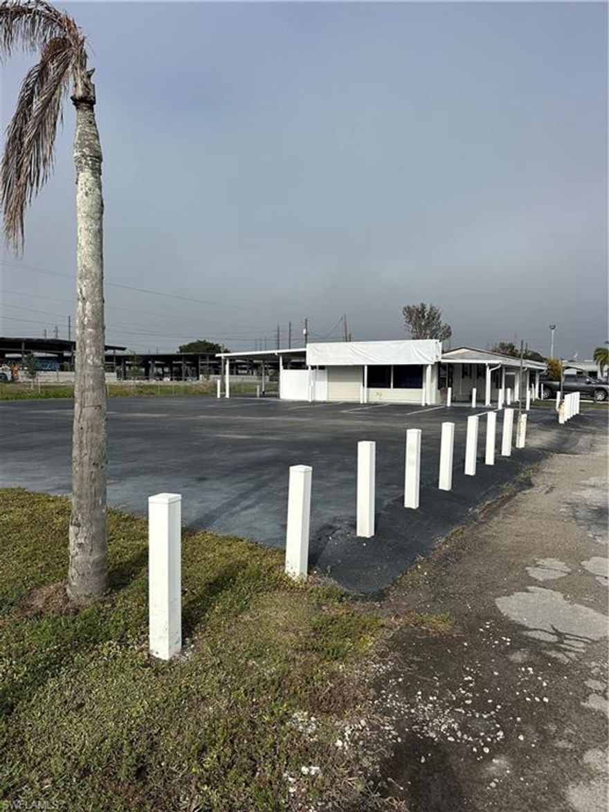 Rare leasing opportunity offering approximately 1,144± SF of commercial space on Palm Beach Blvd east of I-75—the only car lot in this highly sought-after corridor. This property delivers outstanding visibility and strong traffic exposure, making it well-suited for automotive sales, service, or related commercial uses. A unique chance to establish your business in a prime, high-demand location.