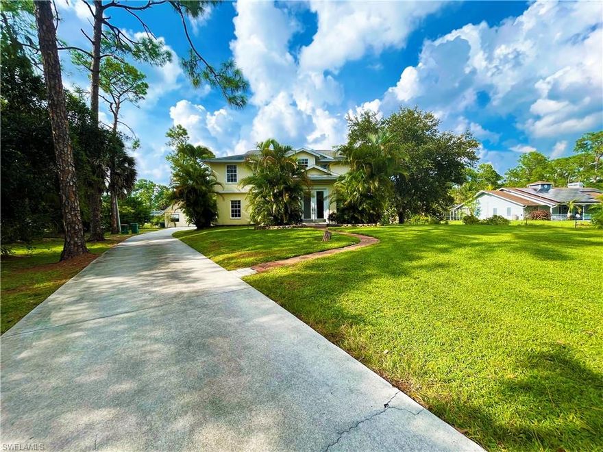 There are three main structures on the property and a small shed in the back. The main house, a four car garage and shop and a guest house. The value of the property is the lot, which is 2.27  acres and is suitable for an upscale large home that would be consistent with those in the neighborhood.  Both the large home and the guest house would make good rental units and the 4 car garage would make a nice shop in addition to housing vehicles.

The pictures shown with furniture have been virtually staged. The house is being sold without furniture.
