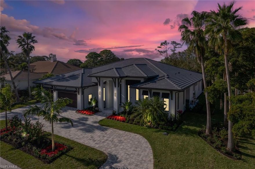 A long-awaited New Construction Smart home, in Audubon Country Club, elegantly design by South Florida Design, Inc. & built by FORGE CONSTRUCTION, LLC. Completed in December 2023, this highly efficient 4 bedroom + Den, 5 full bath, 1 half bath, Saltwater Pool/Spa custom home overlooking the 15th fairway, offering 4,346 sf under air with a total of 6,417 sf of seamless indoor/outdoor living space. An elegant yet casual design includes an open floor plan perfect for entertaining with wet bar, wine frig. The kitchen includes Sub-Zero Refrigerator, Wolf appliances, waterfall quartz counters and oversized walk-in pantry. The private Owners Suite incl. dbl vanities, multiple head walk-in shower, spa tub & his/hers closets. This split bedroom floor plan offers three add'l family size bedrooms all w/private bath. The lanai features a summer kitchen, casual dining & living w/gas fireplace and state-of-the-art Pentair pool system w/custom lighting, Pool bath, outdoor shower and picture window screens. Audubon Country Club is located in North Naples minutes to Vanderbilt Beach and The Mercato, with only a short drive to everything downtown Naples has to offer. Furnished photos from model home