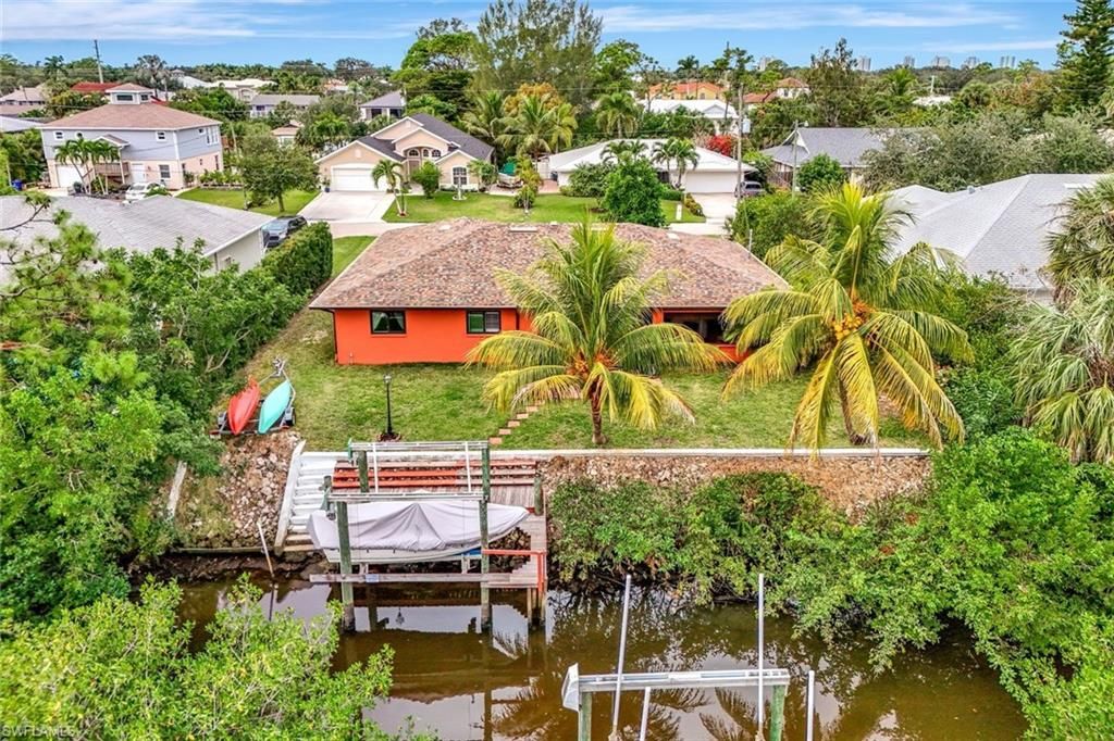 Photo of 27065 Belle Rio DR, BONITA SPRINGS, FL 34135 (MLS # 225082718)