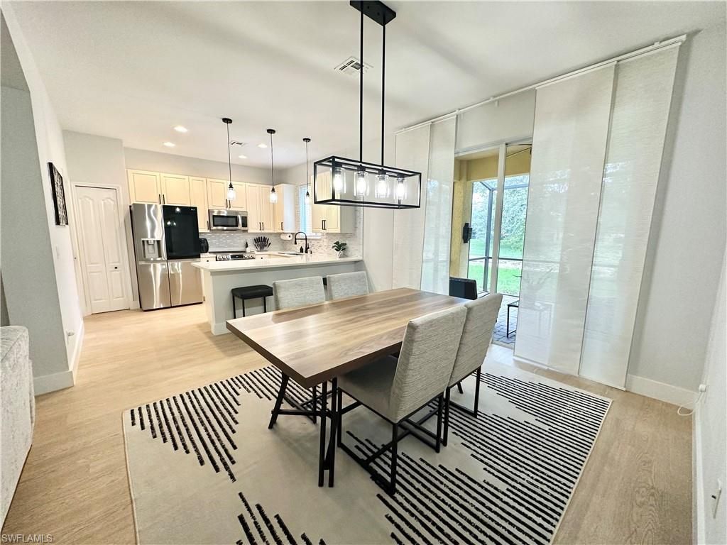 Photo of 10190 Tin Maple DR #128, ESTERO, FL 33928 (MLS # 226005045)