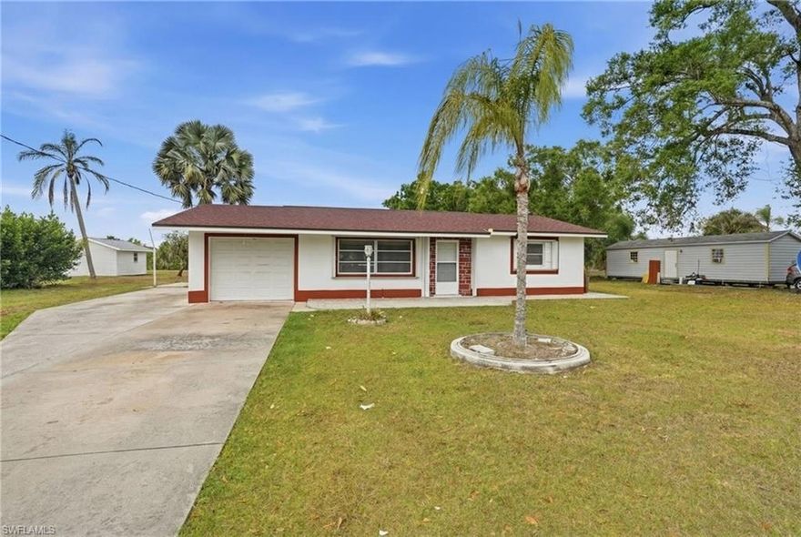 Discover this charming three bedroom, two bathroom home situated on an oversized lot of almost 1 Acre, in the beautiful and popular area of Alva. Located just minutes from I-75 and close to main roads, like Palm Beach Blvd, this property offers both comfort and convenience. This property features an updated roof 2023, an updated AC  2023, fresh interior and exterior paint from 2023, and updated flooring, and all new modern lights thru the whole house. Both bathrooms were exquisitely designed in 2023, featuring a luxurious and modern style, featuring tile all the way to the ceiling, The master bathroom includes a spacious walk-in closet and a beautifully tiled walk-in shower that also reaches the ceiling, with enough space to add a bathtub if desired...  Enjoy a large private yard offering peaceful scenery and stunning sunsets. The home is also only a short drive from some of Florida’s most beautiful beaches.
The garage features a partially built structure that can be used as an extra room. It presents an easy opportunity to convert the space for workspace or whatever you want.
This property offers generous outdoor space, a spacious driveway with ample room for multiple vehicles, privacy, and excellent potential, perfect for anyone looking to invest, expand, or enjoy peaceful living with quick access to everything Alva has to offer.
Don't miss out this incredible opportunity, schedule your private tour today!