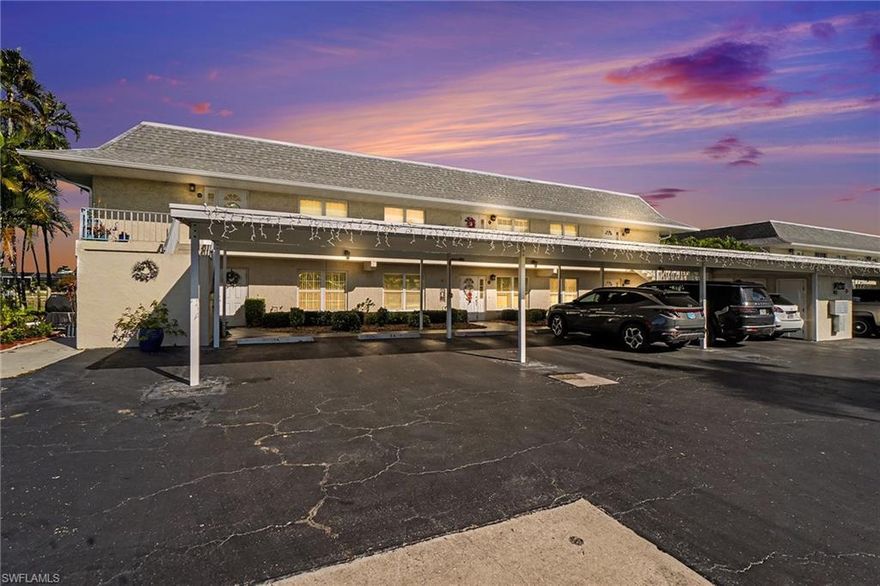 The owner of 35 years is ready to say goodbye to this stunningly remodeled and turnkey furnished condo.  This first-floor end unit is very spacious.  As you walk in, you'll see a large room with space for an office/den or morning room.  The kitchen has all new appliances, solid wood cabinetry and quartz counter tops.  It also has a generously sized living and dining area, plus breakfast bar.  The large master suite has a private bath and walk-in closet.  There is also a guest bedroom and second bath, plus a roomy laundry room with more cabinets for additional storage and a large countertop for folding clothes.  Your assigned covered parking space is just 5 feet from your front door and you’ll have an outside storge closet as well.  Out back you’ll enjoy amazing views over the 200’ wide Partridge Canal from your living room and lanai.  You will love having your own boat slip which is under contract to be rebuilt, and it provides amazing gulf access.  It is just ½ mile away from the river with no bridge restrictions.  This unit is also just ½ mile walk to the new Jaycee Park.  Scheduled to open in April, the new Jaycee park will be a beautiful waterfront oasis and will have a boardwalk and boat slips along the Caloosahatchee River.  It will also include two new playgrounds, a picnic area, bandshell and a 5,000sf splash pad, plus beach volleyball, cornhole and ping pong tables.  The association has all new roofs soffits and gutters installed in 2024.  You’ll also enjoy the heated association pool which provides beautiful water views as well.  Your piece of paradise can be had at a much lower price than you ever imagined.  Make an appointment today to see this stunningly remodeled end unit which is being offered turnkey furnished with all new furnishings and see what your money can buy.