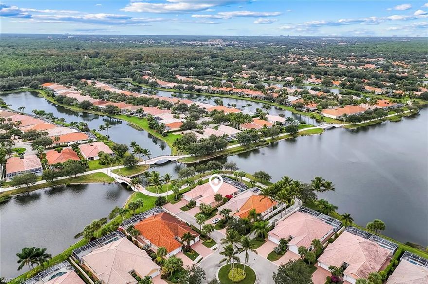 Breathtaking Western Sunsets from your private pool and lanai looking down an amazing long lake view in beautiful Island Walk.  This Capri model is perfect for relaxing and entertaining. This spectacular scenery can be enjoyed from the kitchen and living areas.  This 2 bedrooms/2 full baths villa is sunlight filled.  Tile flooring throughout the main living areas. Built in cabinetry in the living area for your media needs. The quiet cul de sac location adds serenity to your oasis.  Residents of Island Walk residents enjoy access to exclusive amenities including a Resort style pool, a separate lap pool, a newly renovated Towncenter, 7 Tennis courts, 4 pickleball courts, bocce, a state of the art fitness center, Restaurant, Hair and Nail Salons, Car Wash, Gas Station and Post Office. Close to Naples’ sandy beaches, wonderful shopping, and dining.