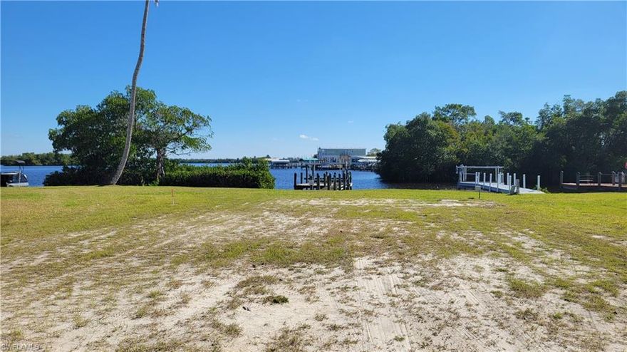 Looking for a beautiful waterfront lot to build your dream home: THIS IS IT!  Located on the Caloosahatchee River just 7 miles from downtown Fort Myers.  This lot is located in a 55+ Community with tons of activities.  The Orange Harbor Community has had quite a few new homes built with more in progress.  
There is currently a dock and lift located on the property.  Stop out and take a look at the spectacular views.
Orange Harbor is a 55+ Community which allows pets.  Please cheek out our website for specificates.