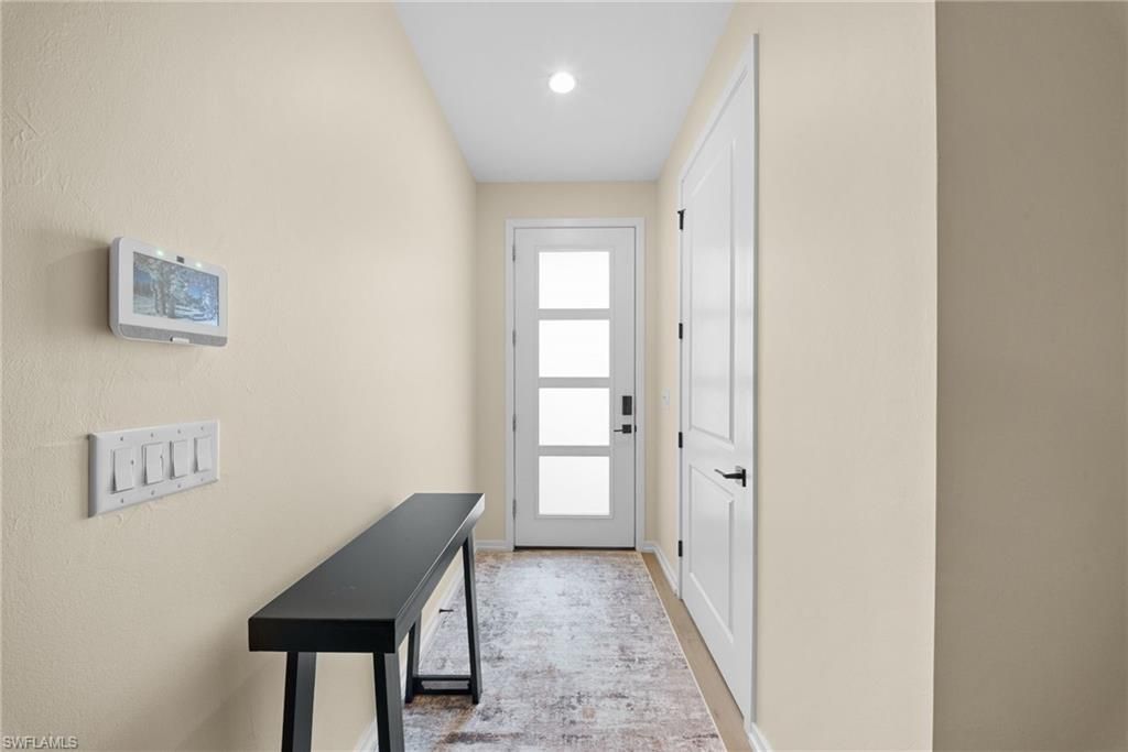 Photo of 13005 Pembroke DR, NAPLES, FL 34105 (MLS # 226010246)