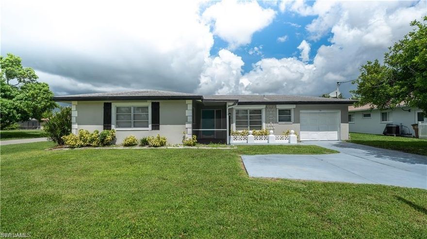 LOVELY HOME FOR SALE!!!NEW ROOF FROM NOVEMBER 2021, PLUMBING AND PIPING INSTALLED IN 2020, NEW A/C INCLUDING COMPRESSOR AND AIR HANDLER AND DUCT WORK AND NEW KITCHEN CABINETS FROM 2020, BATHROOMS REFURBISHED AND NEW VANITIES INSTALLED ON 2019. HOUSE HAS STORAGE FOR BOATS OR EXTRA CARS. IT ENJOYS A VERY LARGE CORNER LOT WITH SEPARATE SIDE ENTRANCE THROUGH THE 6 FT HIGH GATED FENCE WHICH SURROUNDS THE PROPERTY. THE FLORIDA ROOM HAS BEEN WOOD FRAME  ENCLOSED AND AIR CONDITIONED MAKING THE PROPERTY VERY SPACIOUS ,YET THIS STILL ENJOYS A COVERED AND SCREENED LANAI. IN ADDITION PROPERTY IS TILED THROUGHOUT. THE PROPERTY ALSO HAS EXTRA SPACE IN THE BACK AND HAS A SEPARATE GARAGE THAT CAN BE USED AS A STORAGE SHED AS WELL! DONT MISS THIS OPPORTUNITY, WILL NOT LAST LONG!!!!!