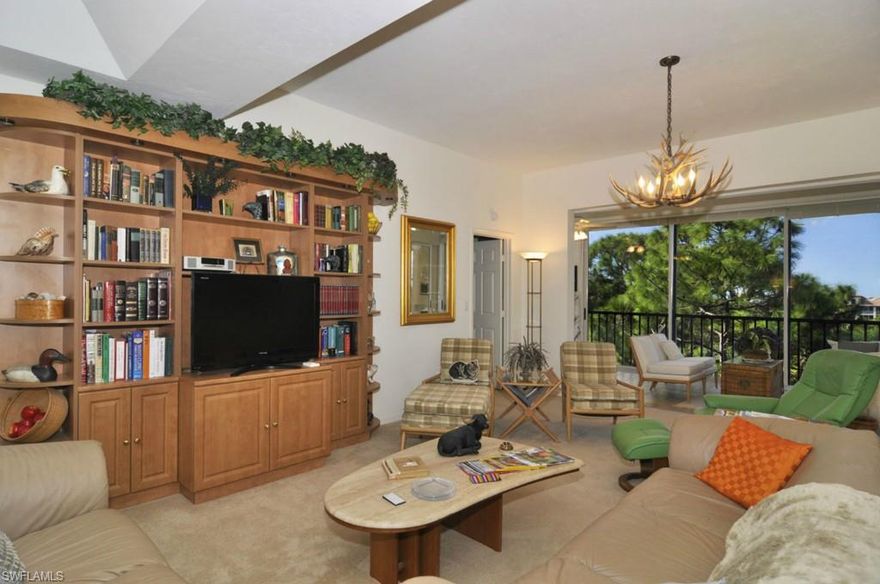 C.10730 - Live in the treetops.  Golf course and lake views from this sixth floor unit.  Ten foot ceilings with no other unit on top for much of the condo.  Granite countertops and extended cabinetry in the kitchen.  Glassed in lanai for year round living.  Premium parking spot in the underbuilding parking garage.  Community pool and spa.  Bonita Bay offers a private beach , hiking and biking trails, a full service marina with a restaurant, golf courses, tennis courts and a fitness center.