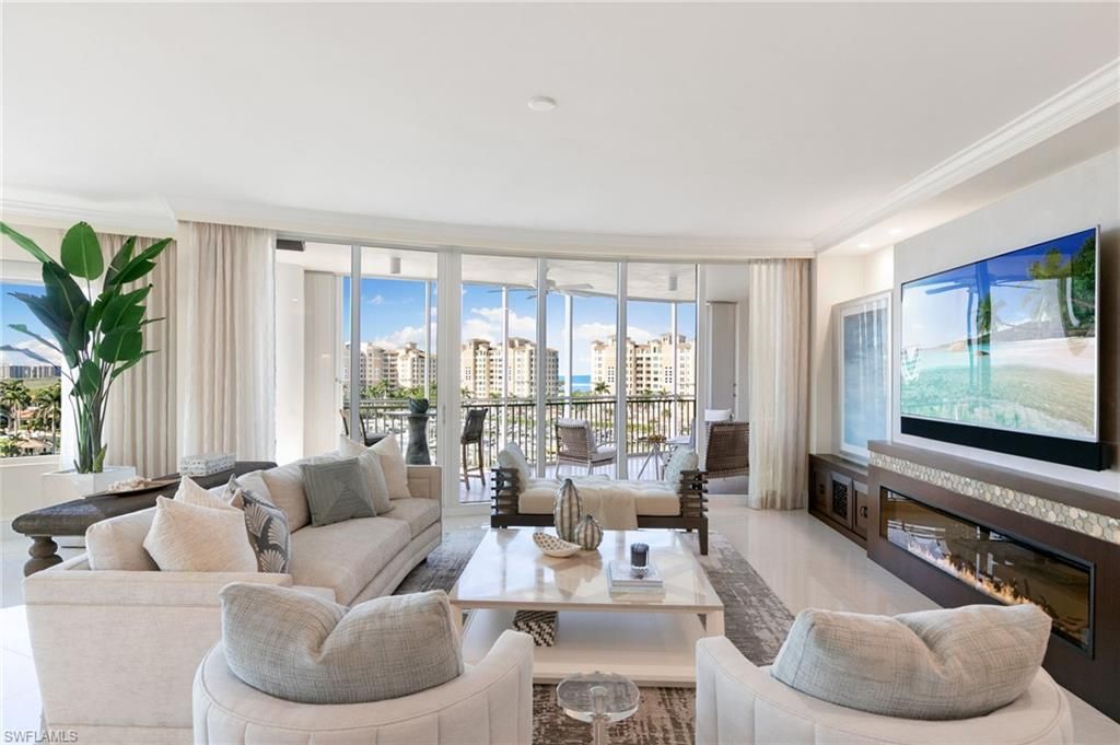 Photo of 13665 Vanderbilt DR #701, NAPLES, FL 34110 (MLS # 226012783)