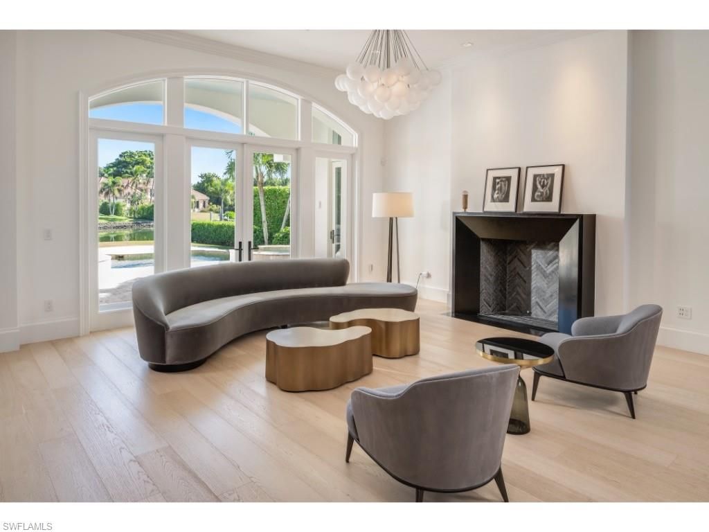 Photo of 997 Spyglass LN, NAPLES, FL 34102 (MLS # 225080529)