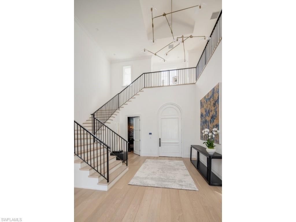 Photo of 997 Spyglass LN, NAPLES, FL 34102 (MLS # 225080529)