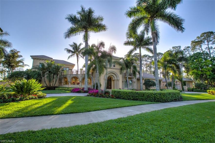 This elaborately landscaped "Majorca" Estate from renowned builders, Gulfshore Homes, artfully combines elegance and comfort into a residential masterpiece. Circular driveway, exterior columns along with wrought iron gate & balconies compliment the stone facade. The interior is exquisitely detailed with marble floors & countertops, custom ceiling designs and elegant stone fireplaces. Offering 10,000 Sq. Ft. of total space and situated on a 1.3 acre lot, this estate provides exceptional living and entertaining space for family & friends. Boasting a state-of-the art home theater with a 110" screen and superb sound system. Relax in your private courtyard with bubbling fountain and lush florals surrounding your private pool & spa. Architectural designs such as the piazza connecting the main home to guest house, truly make this estate a work of art. Culinary art will also be a pleasure to create in your kitchen boasting top of the line appliances and butler's pantry. Large master w/panoramic views of the course and 2 master baths, 4 guest suites and a temperature controlled wine room are just few of the many features that make this premier lifestyle home a singular creation.