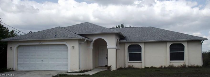 Great 3 bedroom 2 full bath and 2 car garage single home in Lehigh Acres needs a little loving care to make it a great rental or to live in.  Don't hesitate or it will be too late.