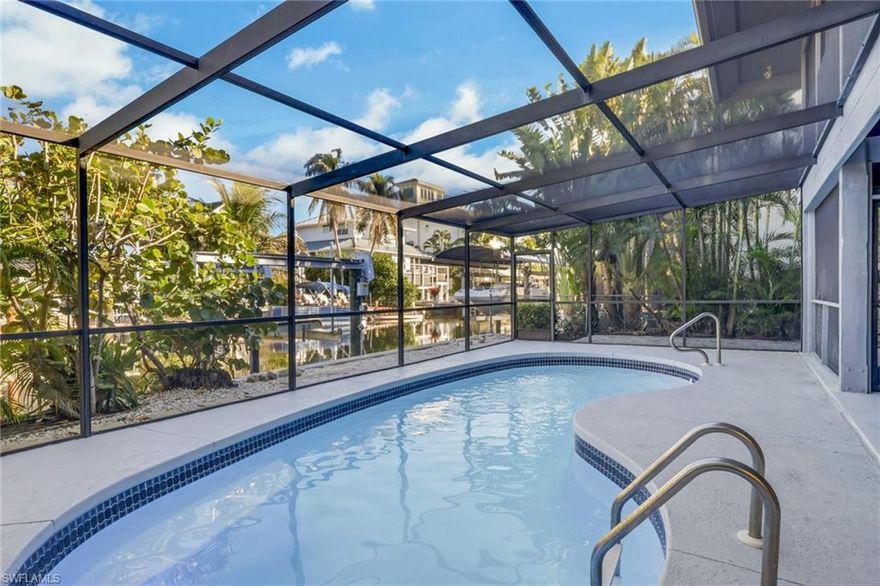 DAILY RATE- Welcome to Naples Hidden Gem, a newly renovated canal-front home located west of Route 41, thoughtfully designed for large families or families traveling together. This private retreat sleeps up to 10 guests and offers the perfect balance of shared space and personal privacy. The home features a 1-bedroom, 1-bath efficiency with a queen bed, pull-out sofa, and walk-out access to the screened pool area, ideal for extended family, or guests who want their own space. Upstairs, you will find two newly renovated master suites, each with private, updated bathrooms, along with an open-concept kitchen, living, and dining area. Vaulted ceilings and abundant natural light create a warm, open atmosphere, while a renovated half bath adds extra convenience. Step outside and enjoy the charm of an Old Naples, Key West–style neighborhood. The canal-front setting offers a relaxed coastal feel, complete with bikes, paddleboards, a propane grill, and inviting outdoor spaces perfect for making memories together. Located just minutes from Wiggins Pass State Park beaches, as well as premier shopping and dining at Mercato, this home puts you close to everything Naples has to offer while still providing a quiet, private escape. Whether you are planning a multi-generational family vacation or traveling with friends, this property delivers space, comfort, and the true essence of the Naples, Florida vacation experience.