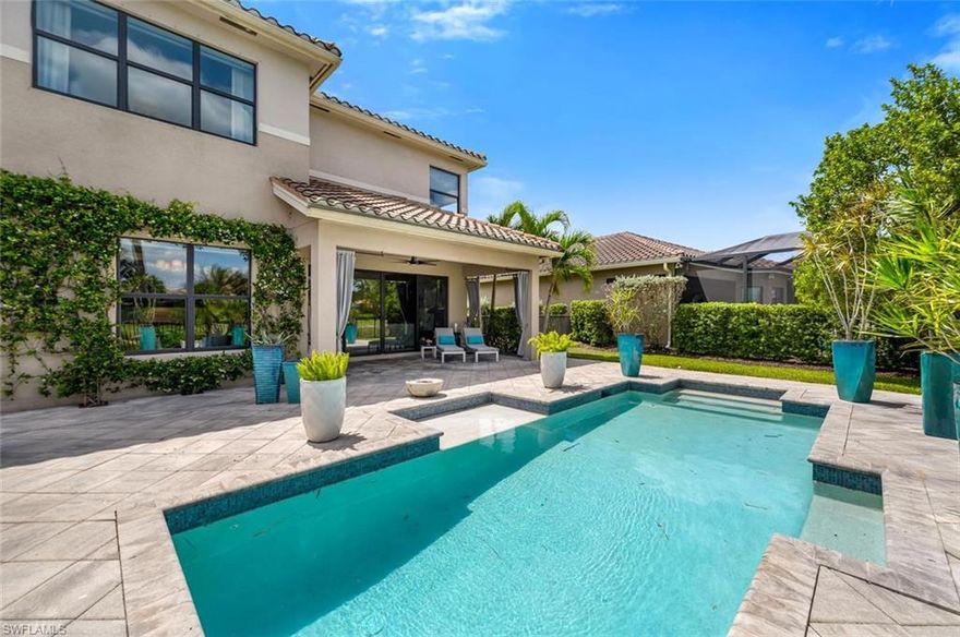 X-Flood Zone! No flood insurance required. Extra large lot providing a spacious side yard with lake views. Gorgeous Conrad floor plan designed for wellness, comfort, and effortless living, this exceptional residence has been meticulously maintained using non toxic, organic treatments throughout the interior and exterior, creating a truly health conscious environment. Marbella Isles is a recognized Blue Zone project community. The layout includes a main level guest suite and full bath, while upstairs offers a private primary retreat, additional guest rooms, a loft lounge with beverage station, and a well appointed laundry room. The outdoor setting is entirely custom, featuring an extended pool deck, heated saltwater pool, full fencing for privacy, widened driveway, and an expanded entry. Inside, the home is refined yet inviting, with custom painted feature walls by a local artist, designer lighting, and a cohesive palette of elevated finishes including quartz surfaces and tailored cabinetry. Enhancements such as custom closet systems, built ins, pocket doors, and designer window treatments add both function and style. Modern systems include a smart thermostat, Lutron lighting, surge protection, and generator connection, ideally located near Naples beaches, dining, and shopping.