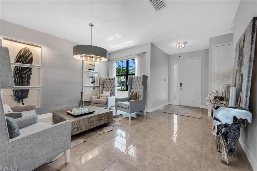 Photo of 13539 Mandarin CIR, NAPLES, FL 34109 (MLS # 226016882)