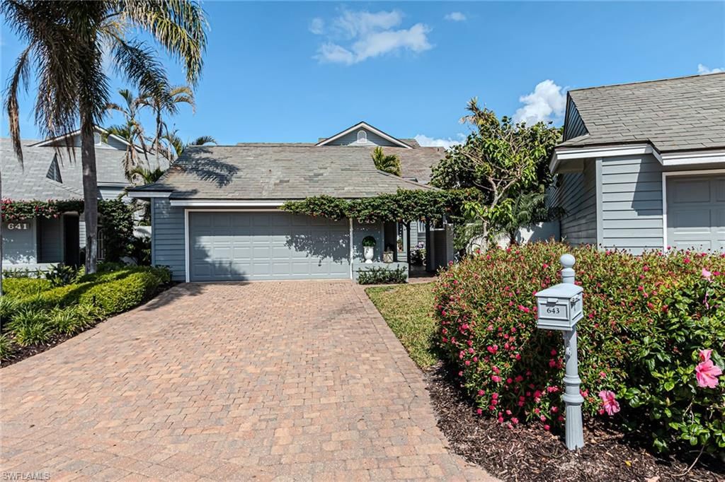 Photo of 643 Bridgeway LN, NAPLES, FL 34108 (MLS # 225011332)