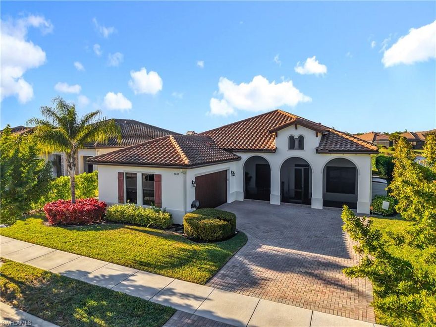 Experience elevated living in this exceptional 4-bedroom, 3-bath residence showcasing nearly 2,900 sq ft of refined interior space, soaring 12-ft ceilings, and breathtaking lake views. Thoughtfully designed and beautifully upgraded throughout, this 2019 home delivers the perfect blend of luxury, comfort, and style in one of Ave Maria’s most desirable neighborhoods. The chef’s kitchen serves as the centerpiece of the home, featuring a wall oven and microwave, premium cabinetry, expansive countertops, and an open layout ideal for entertaining. Impact windows provide peace of mind, while tile flooring throughout adds a clean, upscale finish. Every detail has been elevated, from upgraded lighting to refined finishes that enhance each room. Step outside to your private outdoor retreat. The screened-in lanai, sparkling pool, and relaxing spa all overlook a serene lake, creating a resort-style atmosphere right at home. The outdoor space is perfect for gatherings, quiet evenings, or simply enjoying Florida’s year-round sunshine. Additional highlights include a 2-car garage, pavered driveway, upgraded landscaping, and a screened front entry for added comfort and appeal. Residents of Maple Ridge enjoy access to a world-class amenity center featuring a resort-style pool, fitness facility, dog park, billiards room, playgrounds, sports courts, walking paths, and vibrant community events. Living in Ave Maria means unmatched lifestyle, convenience, and small-town charm.