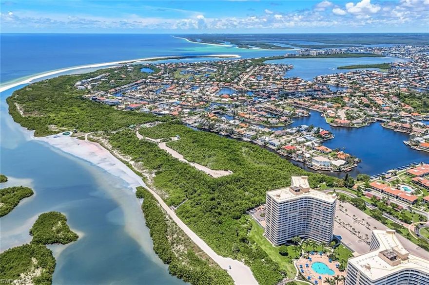 Wake up to the sound of the surf and breathtaking panoramic views in this beautifully updated top-floor beachfront residence in the highly sought-after South Seas Club on Marco Island. This 2-bedroom, 2-bath condo offers 1,070 square feet of light-filled living space, showcasing sweeping Gulf views alongside stunning vistas of Marco Island--creating a truly elevated coastal living experience. Recently refreshed with updated furnishings and a clean, modern aesthetic, this residence is move-in ready and perfectly suited as a private retreat or turnkey investment. The thoughtfully designed floor plan offers comfortable living and dining areas that flow effortlessly, ideal for both relaxing and entertaining, while both bedrooms provide privacy and comfort. Located within the gated South Seas community, residents enjoy direct beach access along with resort-style amenities including a community pool, pickleball and tennis courts, boat dock leasing opportunities, and scenic walking paths throughout the beautifully maintained grounds. Open covered parking adds everyday convenience. With the ability to rent weekly up to 36 times per year, this property offers exceptional flexibility and strong income potential--making it an ideal choice for both personal enjoyment and investment. Experience the best of Marco Island beachfront living from this top-floor vantage point.