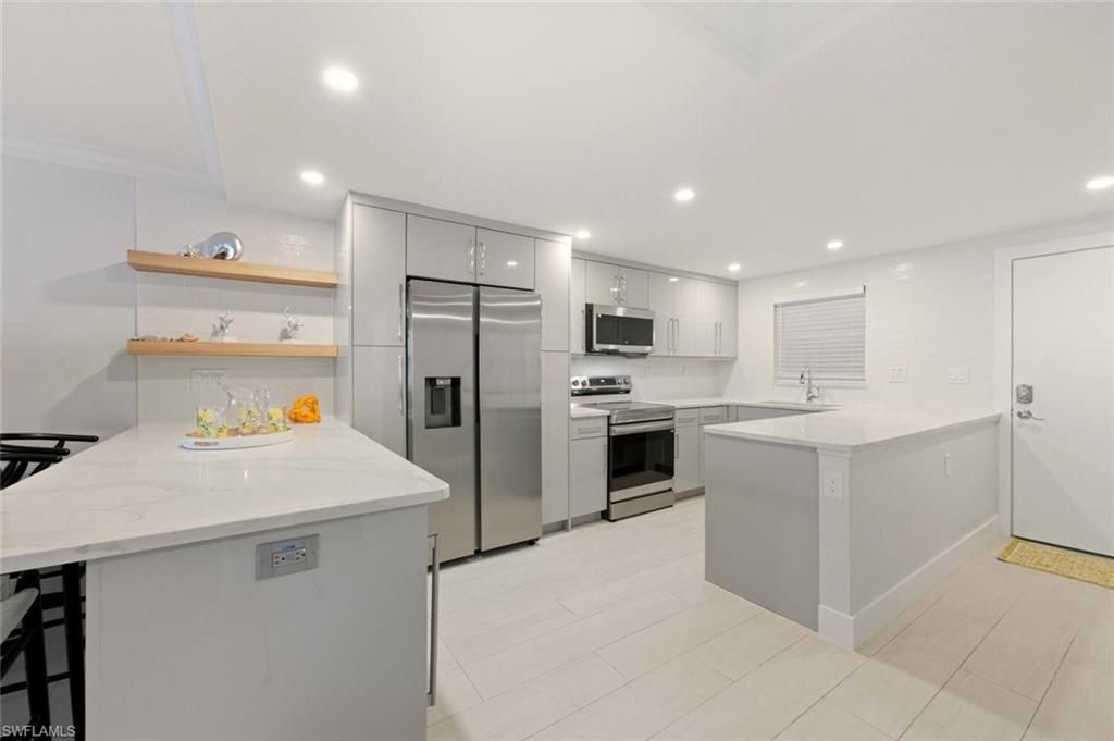 Photo of 900 8th AVE S #103, NAPLES, FL 34102 (MLS # 226005185)