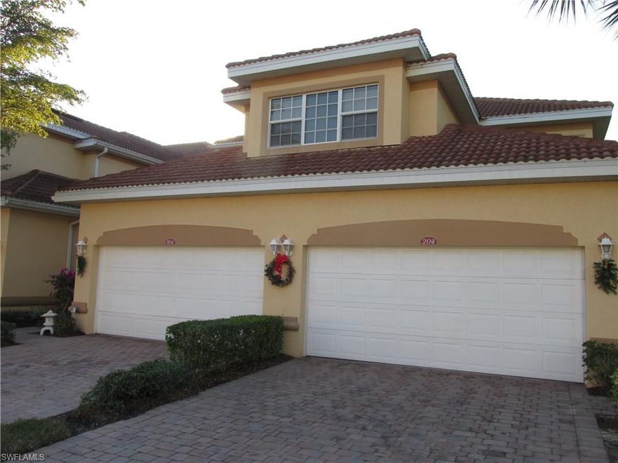 Immaculate 4 bedroom 2.5 bath 2 car garage lake front Carriage home in Bell Tower Park.  This property built in 2006 boasts over 2300sf of living area, tile and wood flooring throughout, large kitchen with stainless appliances, sold surface countertops, upgraded cabinets, spacious bedrooms, crown molding, updated master bath, hurricane impact glass windows, huge wrap around screened lanai overlooking the lake and preserve areas, paver driveway walking distance from the pool and so much more.  Bell Tower Park has an outstanding location near shopping, restaurants, lakes park, and close to the beaches. Pride of ownership shows in this property so bring your most meticulous buyers!!!