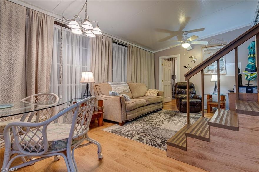 Back on the market, this little place is great for your winter retreat.  It even has 2 bedrooms and 2 bathrooms so you can have guests.  It is located in a gated, active, 55 plus community where you OWN the land.  THIS IS NOT A CO-OP!  It features a little patio in the back which looks over a common green space.  The lanai/Florida room has a lot of windows making that area nice and bright.  Located about 8 miles from Marco Island and 12 miles from downtown Naples with all of it's activities.  It is only about 3 miles to WalMart, Walgreens, CVS. Lowe's, Staples, Publix.  Come on down and check out this neighborhood.  You'll love it!