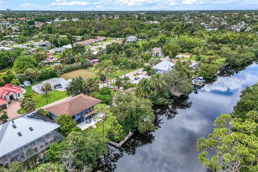 THIS is the GULF ACCESS home YOU have been waiting for! MINUTES from the GULF by BOAT near historic downtown Bonita Springs AND PRICED TO SELL as THIS SELLER IS MOTIVATED!!! THIS GORGEOUS FOUR BEDROOM, 2 bathroom RIVER FRONT HOME IS A MUST-SEE! Recently renovated and boasting over 2,900 sq. ft. as the bottom floor has been transformed into stunning livable space. The main floor features an open concept floor plan including updated kitchen with new cabinets, stainless appliances, quartz countertops, large walk-in pantry, vaulted ceilings, views of the Imperial River, wrap around deck, renovated primary bath and SO MUCH MORE. Bottom floor features additional great room and dining area PLUS a guest room with water views. Additional bathroom can be added as the craft room is pre-plumbed making this a perfect space for guests! The layout of this home offers a special place for everyone in the family! Retreat to your primary suite at days end to enjoy sunset skies on your private lanai. Spend cool winter evenings overlooking the river sipping your favorite cocktail. Enjoy your morning coffee on your private dock while visiting with manatees & dolphins. There is SO much to love about THIS house and THIS location…truly what SWFL living is about! The burgeoning Downtown Bonita Springs boasts eclectic restaurants, coffee/wine bars, craft cocktail bars, craft breweries and a new music venue. The arts are alive in Bonita, with plenty of festivals, artist cottages, music in the downtown amphitheater - all just a short bike ride or boat ride from this home. PLUS, only a 10-minute drive to Barefoot Beach (BUT you will likely spend your time at the PRIVATE beaches ONLY accessible by BOAT). DO NOT miss YOUR opportunity to experience all that Bonita Springs has to offer, especially in home!