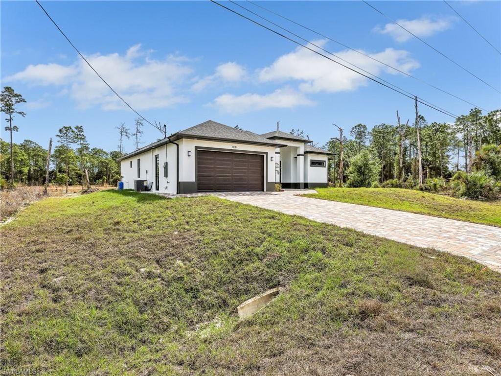 Photo of 808 Willard AVE, LEHIGH ACRES, FL 33972 (MLS # 226011472)