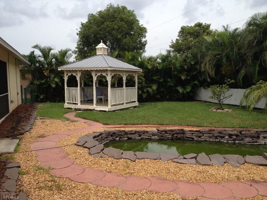 Lovely 3/2/2 in SW Cape, Unit 69. Sit in your gazebo with a fresh cup of coffee and enjoy your very own koi pond every morning before work and/or with a beverage of choice everyday after work and watch the stress disappear. You won't go wrong with this home, so stop by and take a look while you can, it won't last long.