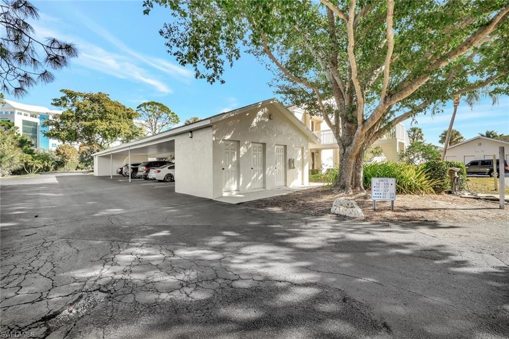 Photo of 910 Vanderbilt Beach RD #325W, NAPLES, FL 34108 (MLS # 226006470)