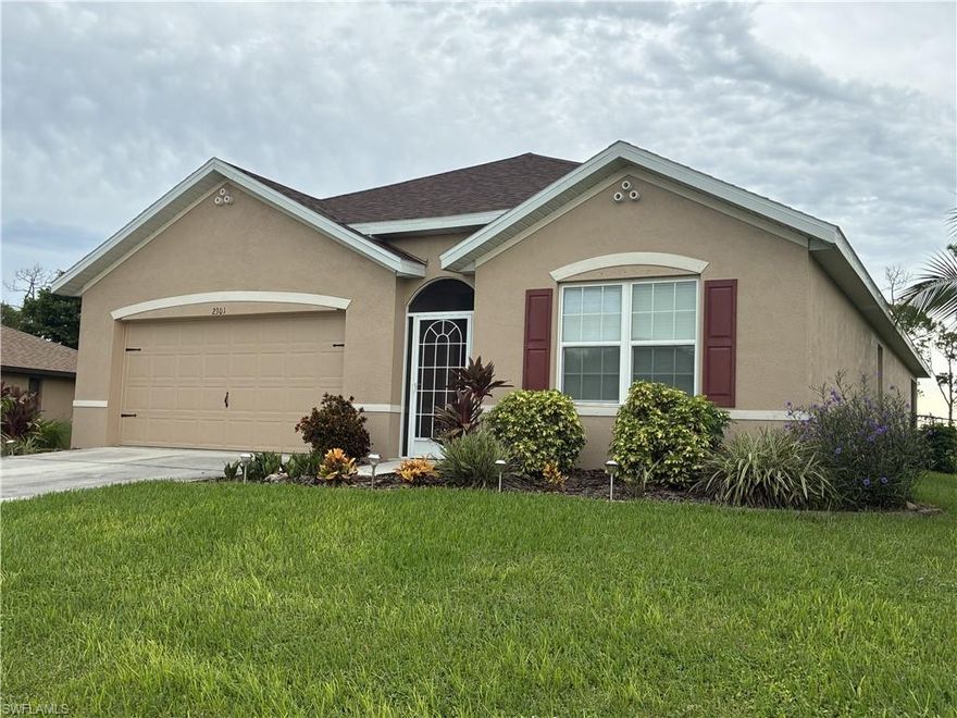 Discover this spacious four-bedroom home located in the highly desirable SW Cape Coral, offering the perfect balance of comfort and privacy. The thoughtfully designed floor plan features beautiful arched doorways, enhancing the home's open feel. Each of the four generously-sized bedrooms is designed with privacy in mind, ensuring a tranquil retreat for everyone in the household.

The prime location is unmatched, with easy access to top-rated schools like Oasis Charter, downtown Cape Coral, and Cape Harbour, along with nearby restaurants. Backing up to the serene Joe Coviello park with its scenic walking trails, this home offers a peaceful, Zen-like atmosphere where you can enjoy daily walks through nature right from your own backyard.

The home has been well-maintained, with exterior paint completed in 2023, a new AC system installed in August 2025, and a new roof added in 2023. The lush, mature landscaping includes your own mango, key lime, and banana trees, creating a tropical oasis. Plus, with automatic sprinklers and ample space for a future pool, the expansive yard is perfect for outdoor living.

Don't miss out on this exceptional opportunity! Whether you're looking for a peaceful retreat, a home close to everything Cape Coral has to offer, or a property with room to grow, this is the one for you. Schedule a showing today and experience the beauty and tranquility of this stunning four-bedroom home. Your dream home is just a call away! Seller has assumable flood insurance at a low rate ** Virtually staged for marketing purposes***