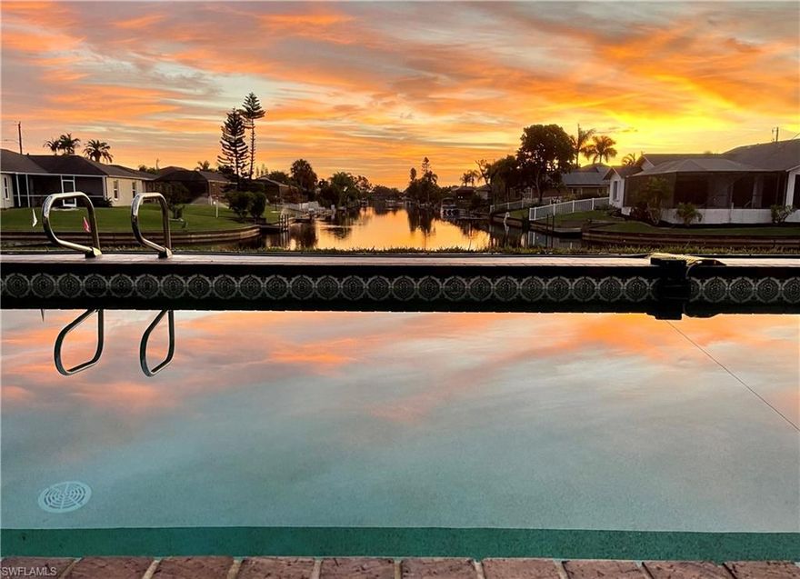 This true waterfront Villa renovated end 2023 boasts luminous open gathering spaces, split bedroom wings, large heated pool & 1000 sq ft of outdoor spaces, with expansive covered patio & cathedral pool enclosure, all with exceptional open water views. Split bedrooms wings with a spacious King Suite with Master Bath, French door to the lanai & stunning sunrise views from your bed on one end & on the other a Garden Bedroom with Queen + foldaway Twin, a Canal Bedroom with Queen, sliders to the pool & open views & a 2nd full bathroom with walk-out to the pool. The new lanai offers heated pool, ample seating & dining areas surrounded by 3 huge picture windows made of the finest no-see-ums super screen, providing unobstructed views & good shade & the pool & bistro lights allow you to enjoy the outdoors all evening long. All this facing an intersecting freshwater canal, which acts as a busy channel for boaters & all sorts of birds, fish, turtles, river otters… from sunrise to sunset. You can hear the splashing all night too! True water & wildlife views, instead of facing another house: let all your stresses melt away in this most serene setting with long views… We offer large smart TVs in living space & every bedroom dedicated desk with computer screen… as well as pool toys, beach & fishing gear, a ladder at the canal to access & secure your pedal boat, canoe, kayak… Double driveway & attached garage with laundry area can also be fully enjoyed. Detailed for a comfortable stay: Call for your private showing 561-927-7350