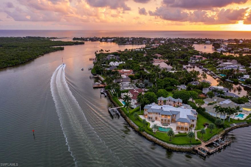 This one of a kind magnificent estate property commands outstanding long water views with 340 feet of unobstructed water front in Port Royal. Striking attention to all details, this home boasts of magnificent gated entry and compound beyond. The presence of this home exudes quality and craftsmanship throughout the massive archways built of stone, defining classic splendor and luxury! Featuring over 15,000 square feet, six total bedrooms with thirteen baths and three bedroom attached guest home this home has all the amenities and benefit of location, to continue the narrative of one of Port Royals finest estates! Formal dining and casual dining areas permit the ideal settings with tremendous southern views. Wine cellar, in home theater, with library and club room all play equal roles of the first level experience of this home. Incredible views await your final touches to create a once in a lifetime estate property perfectly situated on Naples bay!