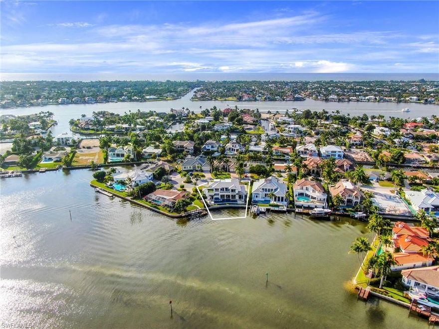 STOFFT COONEY HAS PENNED A MASTERPIECE OF COASTAL LIVING – EACH ROOM HAS BEEN METICULOUSLY DESIGNED FOR BOTH PRIVACY AND BREATHTAKING VIEWS. This home is the perfect retreat for those seeking the most sophisticated waterfront lifestyle!  Located in the highly sought-after community of Royal Harbour, this luxury waterfront home is perfectly positioned with direct open access to the Gulf of Mexico and wide-open, unobstructed views of a tranquil bay with a protected mangrove reserve as your backdrop. Remarkably appointed and bespoke in every way with 6 en-suite bedrooms that have been meticulously designed to blend with the sprawling open floor plan which allows you to host your guests comfortably and entertain with a dramatic amount of room in the living & dining areas. Your outdoor living space has a large lap pool with heated spa and you can enjoy your oasis under the stars as you sit by the fireplace and outdoor dining area with your fully-equipped outdoor kitchen. THIS IS THE BEST NEW WATERFRONT HOME IN NAPLES PRICED AT ONLY $1,200 PER SQ. FT. & IT IS AVAILABLE TODAY.