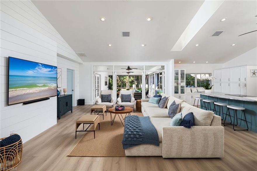 Exquisitely renovated (11/2025) Olde Naples beach home. Long term offerings like this are extremely rare in Olde Naples. Lease the multi million dollar lifestyle at a fraction of the cost! With soaring ceilings and boundless outdoor living spaces, this house flows exceptionally. The house is situated on a larger lot which provides a large outdoor covered, pavered and turf area. Providing four bedrooms & three baths, this sanctuary is situated in one of the finest locations of Olde Naples. The outdoor space feels as if one walked into a botanical garden. Relax pool side, or dine al fresco under the beautiful canopies of mature royal poincianas, palms and mango trees. Walk to both the beach and newly completed Four Seasons Naples Beach Club. With a spacious, open floor plan, some of the features include wide plank flooring, Arhaus/Restoration Hardware/West Elm furnishings, Wolf induction cooktop, marble/tile bathrooms, shiplap walls, skylights, heated pool, putting green and much much more. The master bedroom oasis includes an office desk space and reading sofa. Each bedroom is outfitted with extremely comfortable, high end mattresses and linens. All aspects of this renovation, design and furnishing were intentional; taking inspiration from the natural surroundings of Naples, you truly experience a coastal, luxurious experience. This property has not experienced any flooding in the past storms. 339 4th continues to be meticulously maintained and cared for. True pride of ownership is felt as soon as you walk through the door. Secure one of Naples' finest beach houses today.