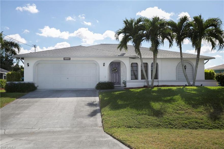 Wow!!!  That's that all that needs to be said about this fantastic Southern Exposure, Pool/Spa Gulf Access home  being sold Turnkey!!!  First and foremost this home is High and dry, NOT LOCATED IN A FLOOD ZONE which will save money and provide peace of mind.  The home itself is ready for YOU!!!  Intersecting Canal Views, Huge Solar Heated Pool (made for volleyball with 3' on each end and deep in the middle...also, has extra high pool cage) with Large Heated Spa, Wrap Around Boat dock with 10K boat Lift, A/C new in 2016 and Roof in 2004.  Inside the home is clean as a whistle and offers fresh pastel paint colors, wood, title and carpet floors, Granite Counter Tops, and much, much more!  Come check out YOUR NEW HOME TODAY!  You will be glad you did!!!!