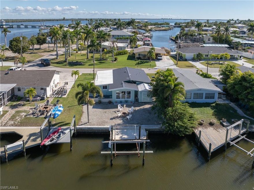 Welcome to 2562 Bayshore Dr, Matlacha, FL 33993

Saltwater Gulf access • No bridges to open water • Waterfront views • Dock & boat lift • Updated systems • Matlacha Island

Saltwater Gulf access canal home with waterfront views located on Matlacha Island, offering direct boating access to the Gulf of America with no bridges via Matlacha Pass and Pine Island Sound. The property includes a private dock and a boat lift that is easily adaptable to accommodate your vessel of choice.

Recent improvements include a metal roof (2021), HVAC system (2023), updated kitchen (2023), fresh interior paint (2026), and a new storage shed. Tile flooring throughout supports easy maintenance and move-in readiness. Central utilities include public water and sewer.

Outdoor living is designed for waterfront enjoyment, featuring a patio suited for grilling and dining with water views, plus a dedicated fire pit area for evening use. Waterfront orientation provides boating, kayaking, and fishing access directly from the property.

Matlacha is a distinctive Gulf Coast island community known for its waterfront restaurants, art galleries, local shops, and fishing culture. The area offers access to inshore and nearshore waters recognized for species including snook, redfish, tarpon, and trout. Pine Island Road serves as the island’s main corridor, lined with locally known dining, galleries, and waterfront destinations that define Matlacha’s colorful character and working-waterfront setting. Community fishing areas and paddling access. 

Short-term rentals are allowed with no restrictions, supporting personal use or investment strategies. No HOA. Listing media includes a virtual tour, Zillow 3D tour, and floor plan available in the photo gallery.