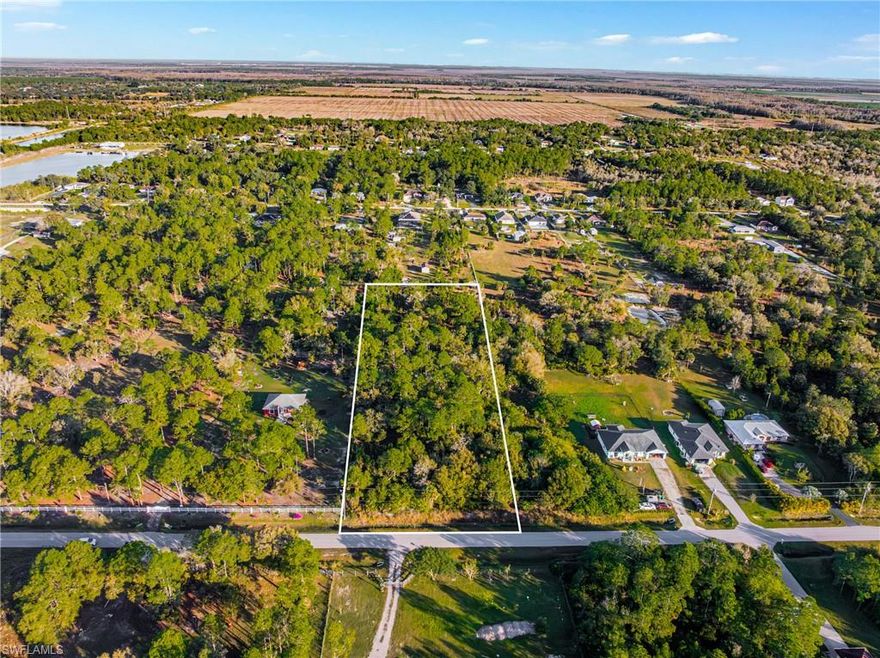 Discover the perfect opportunity to build your dream rural estate on this expansive 2.73-acre lot, where peace, quiet, and ultimate privacy come standard. Situated ideally off 68th Ave NE and Everglades Blvd N, this property offers the best of both worlds: a serene country lifestyle with seamless access to Immokalee Road & nearby amenities. Whether you envision a sprawling family ranch or a private retreat tucked away from the hustle and bustle, the possibilities for this generous acreage are truly endless. While you’ll enjoy the tranquility of wide-open spaces, you are never far from the modern amenities of Southwest Florida. This prime location is just a short 15-minute drive to Publix and local shopping, and less than 20 minutes from the unique charm of Ave Maria. You can enjoy the stars at night and the sounds of nature by day, all while remaining close to the world-class dining, shopping, and beaches that make the Naples area so desirable. Start living the Golden Gate Estates & SW Florida lifestyle today and build the future you’ve always imagined!