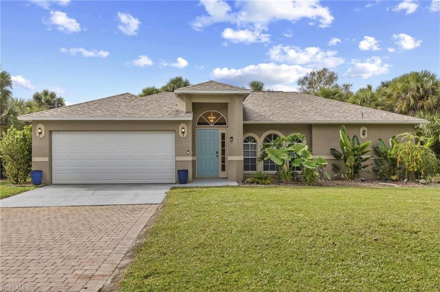 Tucked away on a peaceful 2.73 acre setting with no HOA, this beautifully remodeled 3 bedroom, 2 bathroom home offers privacy, space, and a strong connection to nature. Completed in 2025, the total remodel includes the kitchen, primary bedroom, and both bathrooms, along with fresh interior paint, a newer washer and dryer, a newer water heater, and a brand new septic system, providing comfort and peace of mind from day one.

Inside, the home is light and bright with soaring cathedral ceilings, a spacious living area, and arched windows that bring the outdoors in. The updated kitchen offers ample storage and flows into the adjacent dining area, making everyday living and hosting easy. A split bedroom floor plan provides separation, with the spacious primary bedroom offering direct access to the lanai and an updated ensuite with dual vanities and a walk in shower. Two additional bedrooms share a full bathroom.

Outdoors is where this property truly shines. A stocked fish pond with a dock and water display creates a peaceful focal point and attracts abundant wildlife, including deer and water birds. Walking trails wind throughout the property, offering space to explore and enjoy the natural surroundings. The recently rescreened lanai provides panoramic views of the pond and grounds and includes an above ground hot tub, ideal for relaxing. A partially fenced yard, mature fruit trees including banana, papaya, coconut, and royal palm trees, and a high elevation setting with no flood insurance required complete the setting.

With thoughtful updates, expansive outdoor space, and exceptional privacy, this property offers a rare opportunity to enjoy a tranquil lifestyle surrounded by nature.