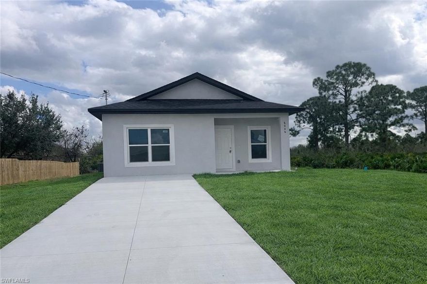 Discover your perfect retreat in Lehigh Acres, FL! This brand-new construction features an open concept floor plan with two bedrooms and two bathrooms, including a primary suite with an ensuite. The home showcases modern lighting and fixtures, complemented by elegant tile flooring throughout. The kitchen is a chef's delight, with a full appliance package and stylish wood shaker cabinets. An inside laundry with washer and dryer hook-ups adds convenience. The large backyard is perfect for outdoor activities or pets, while the covered rear lanai provides a relaxing spot for entertaining. The guest bedroom is spacious, with double closets and a large window, and the guest bath offers tiled floors and a tiled shower. Conveniently located near SR 82 and all local amenities, this clean, move-in ready home is ready for you to make it your own! Photos may not be of actual unit- for marketing purposes only.